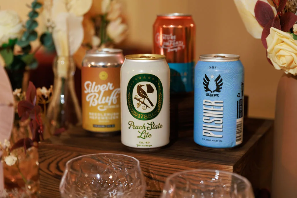 Branded canned cocktail display for a bar service brand activation