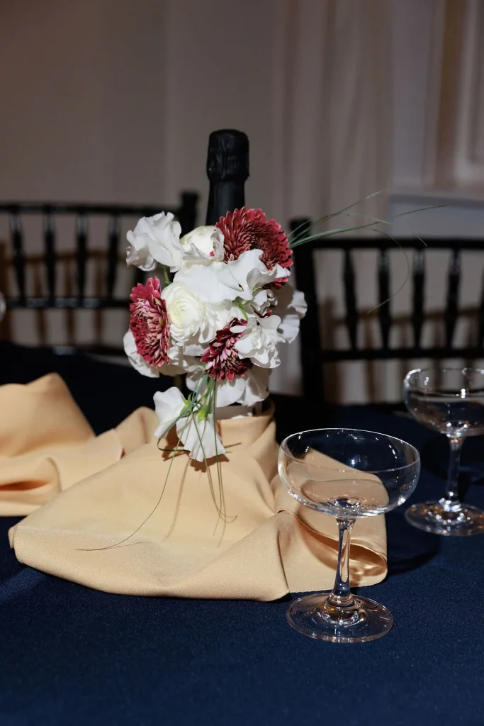 Event table floral detail with glassware for Formosa Bar service