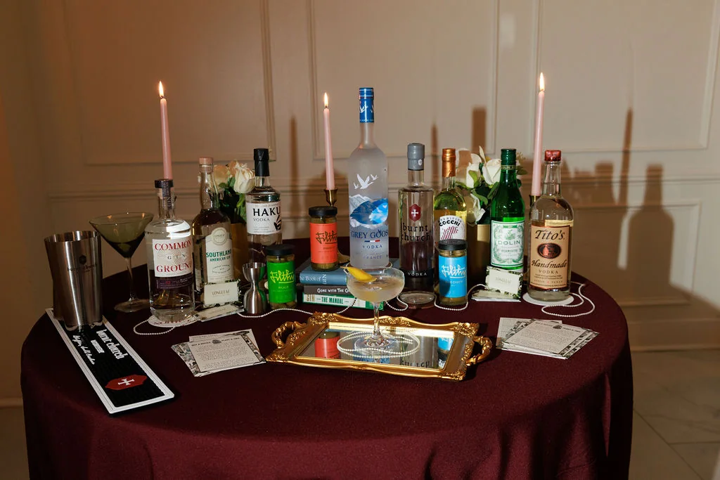 Full Formosa Bar station with spirits, menu cards, and garnishes