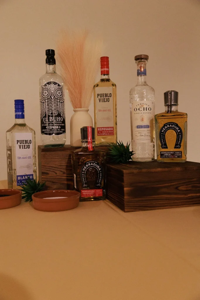 Spirits and mixers setup for a private event bar