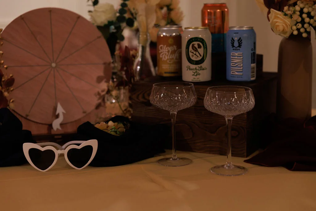 Milestone party bar details with branded drinks and celebration decor