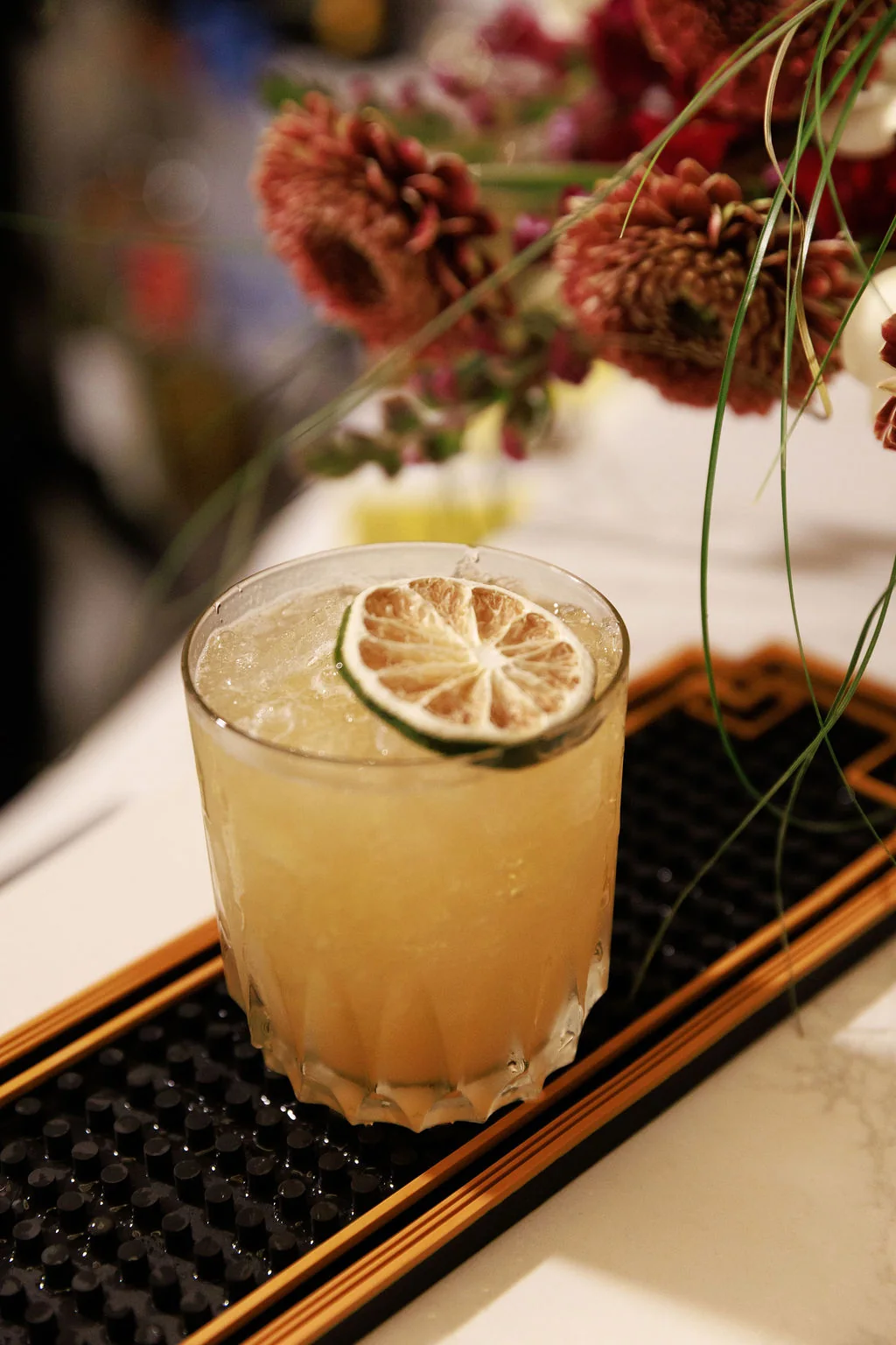 Spicy Paloma citrus cocktail with garnish for an event drink menu